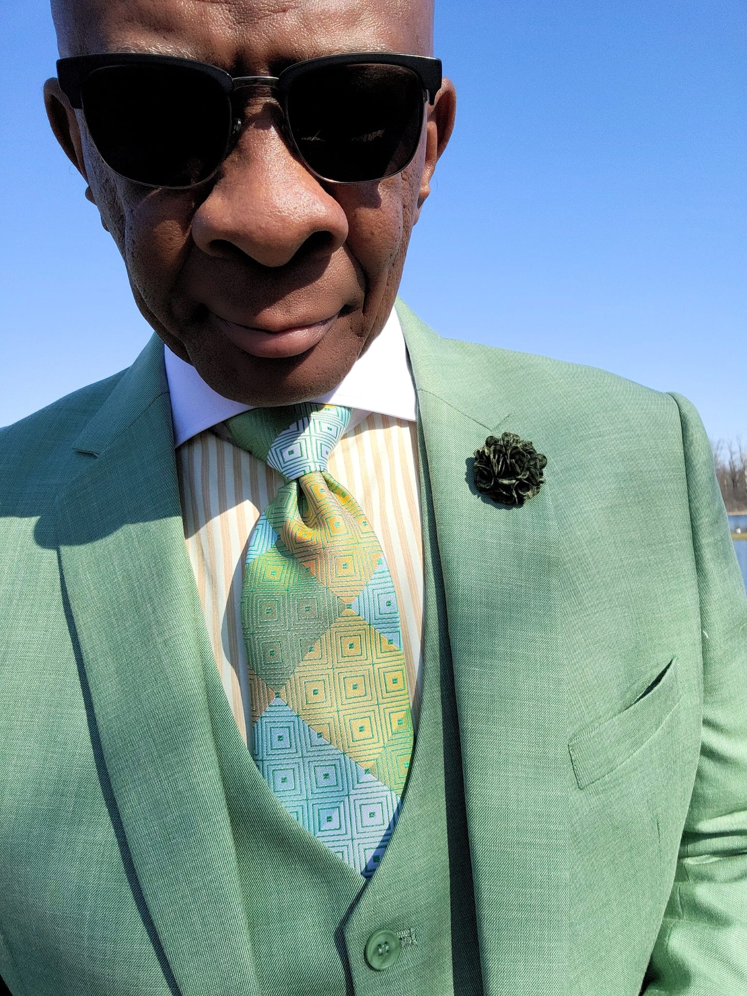striped dress shirt with moss green suit