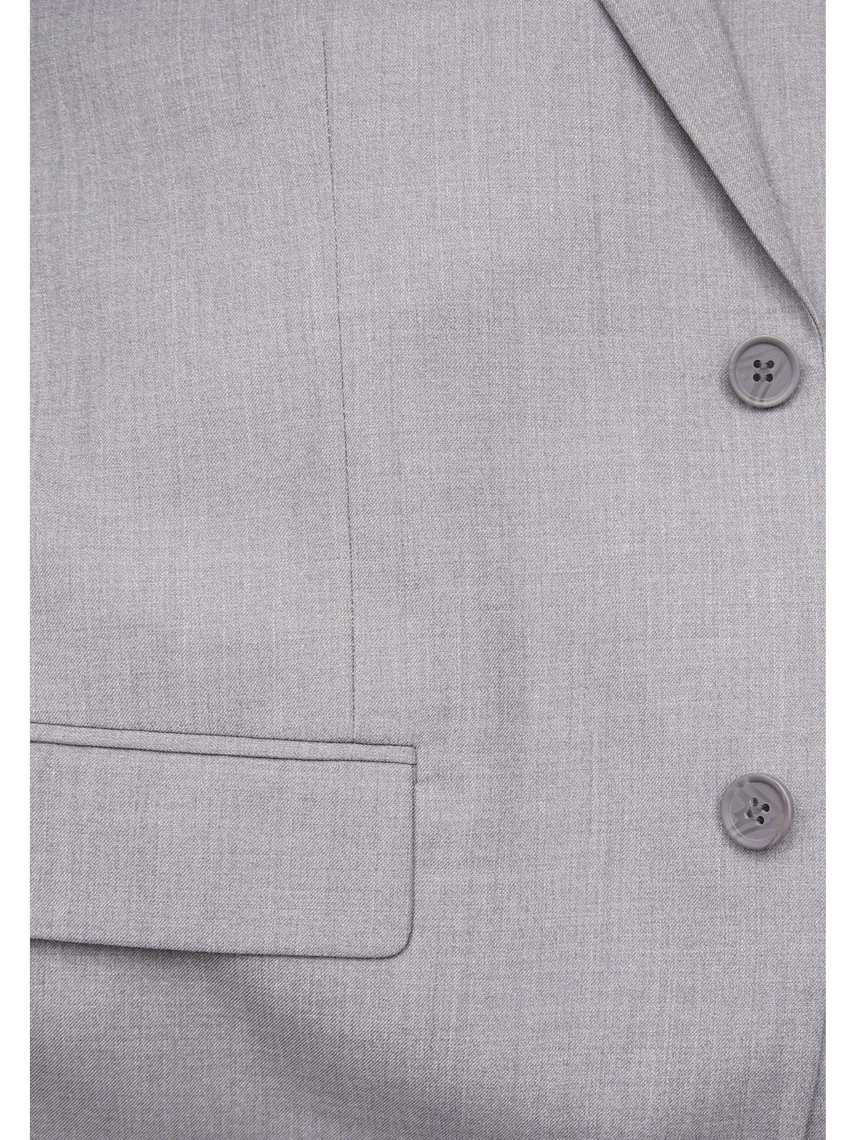close up of light gray men's suit buttons
