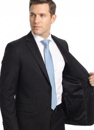 Sartoria Mazara Solid Black Classic Fit Notch Lapel Wrinkle Resistant 2-Button Wool Suit - The Suit Depot